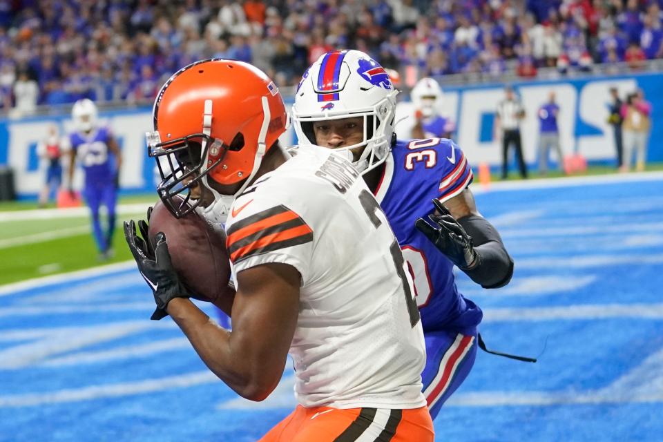 Cleveland Browns wide receiver Amari Cooper (2), defended by Buffalo Bills cornerback Dane Jackson (30), catches a 7-yard pass for a touchdown during the second half of an NFL football game, Sunday, Nov. 20, 2022, in Detroit. (AP Photo/Paul Sancya)