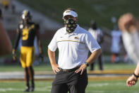 Missouri head coach Eliah Drinkwitz watches his team warm up before an NCAA college football game against Alabama, Saturday, Sept. 26, 2020, in Columbia, Mo. (AP Photo/L.G. Patterson)