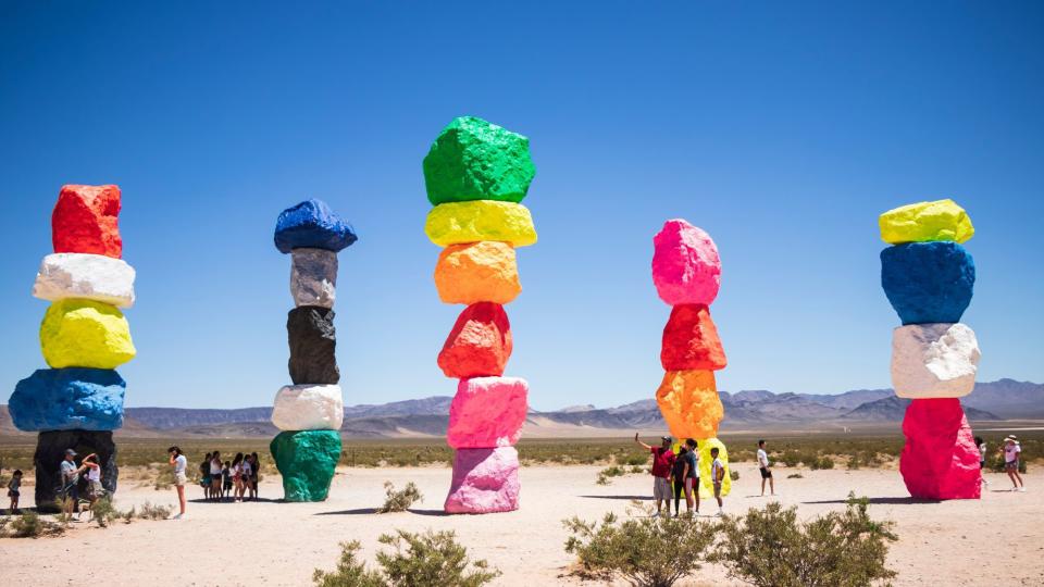 <p>At the <a href="https://sevenmagicmountains.com/" rel="nofollow noopener" target="_blank" data-ylk="slk:Seven Magic Mountains;elm:context_link;itc:0;sec:content-canvas" class="link ">Seven Magic Mountains</a> in Las Vegas, towers of colorful stacked boulders stand more than 30 ft. high for a can't-miss roadside photo opportunity.</p>