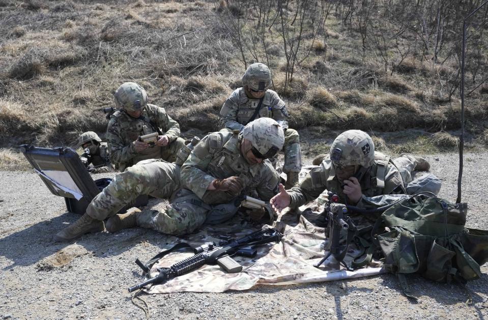 U.S. Army soldiers participate in a joint military drill between South Korea and the United States at Rodriguez Live Fire Complex in Pocheon, South Korea, Sunday, March 19, 2023. North Korea launched a short-range ballistic missile toward the sea on Sunday, its neighbors said, ramping up testing activities in response to U.S.-South Korean military drills that it views as an invasion rehearsal. (AP Photo/Ahn Young-joon)