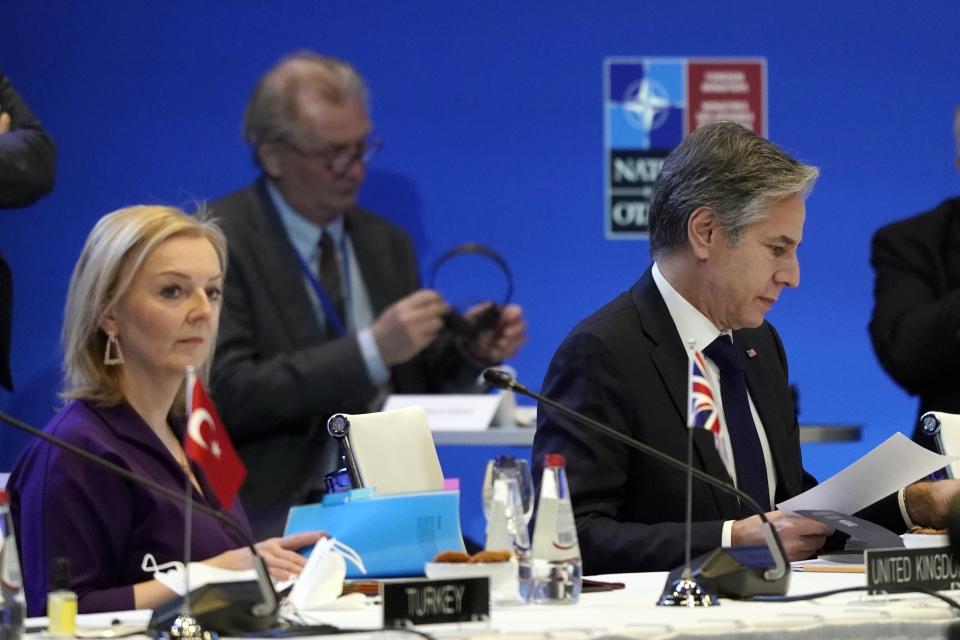 U.S. Secretary of State Antony Blinken, right, and Minister of Foreign Affairs of United Kingdom Elizabeth Truss attend the NATO Foreign Ministers meeting in Riga, Latvia, Wednesday, Dec. 1, 2021. (AP Photo/Roman Koksarov)