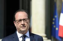 French President Francois Hollande rejected an asylum request from Assange, saying his situation presented no immediate danger