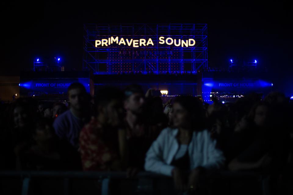 A group of people at night during the first day of the Primavera Sound festival 2022.