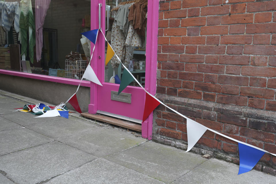 Sample image taken with the Sony FE 16-35mm F2.8 GM II of UK streets with fallen bunting