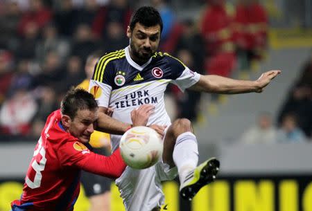 FILE PHOTO: Viktoria Plzen's Marek Bakos challenges Bekir Irtegun (R) of Fenerbahce during their Europa League match in Plzen March 7, 2013. REUTERS/Petr Josek/File Photo