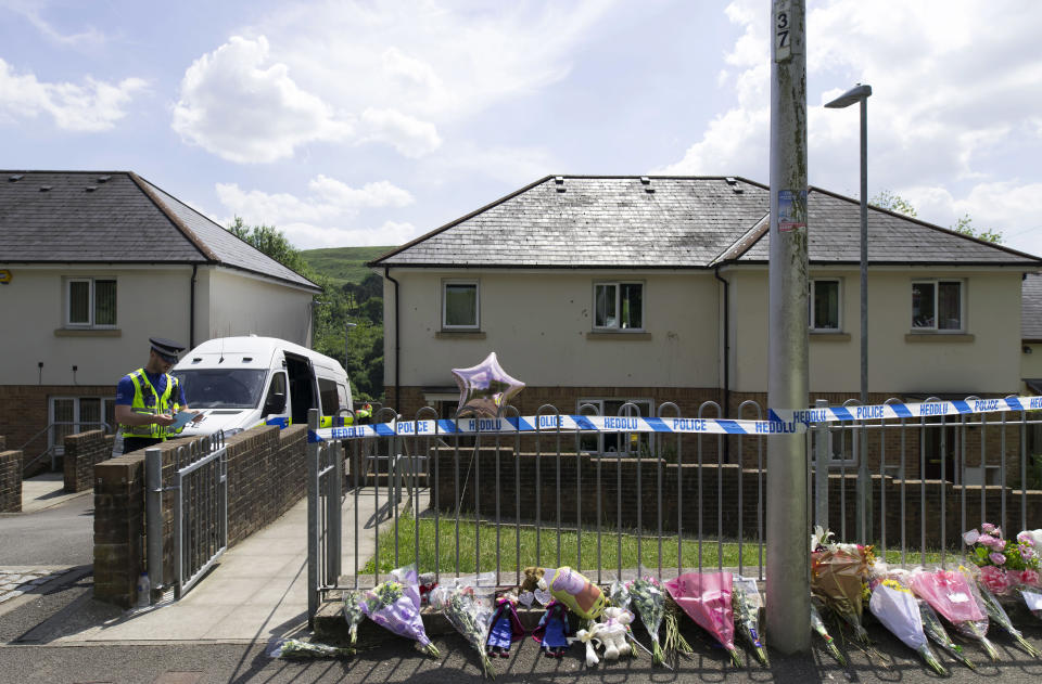 Floral tributes are left at the scene. Image: Getty