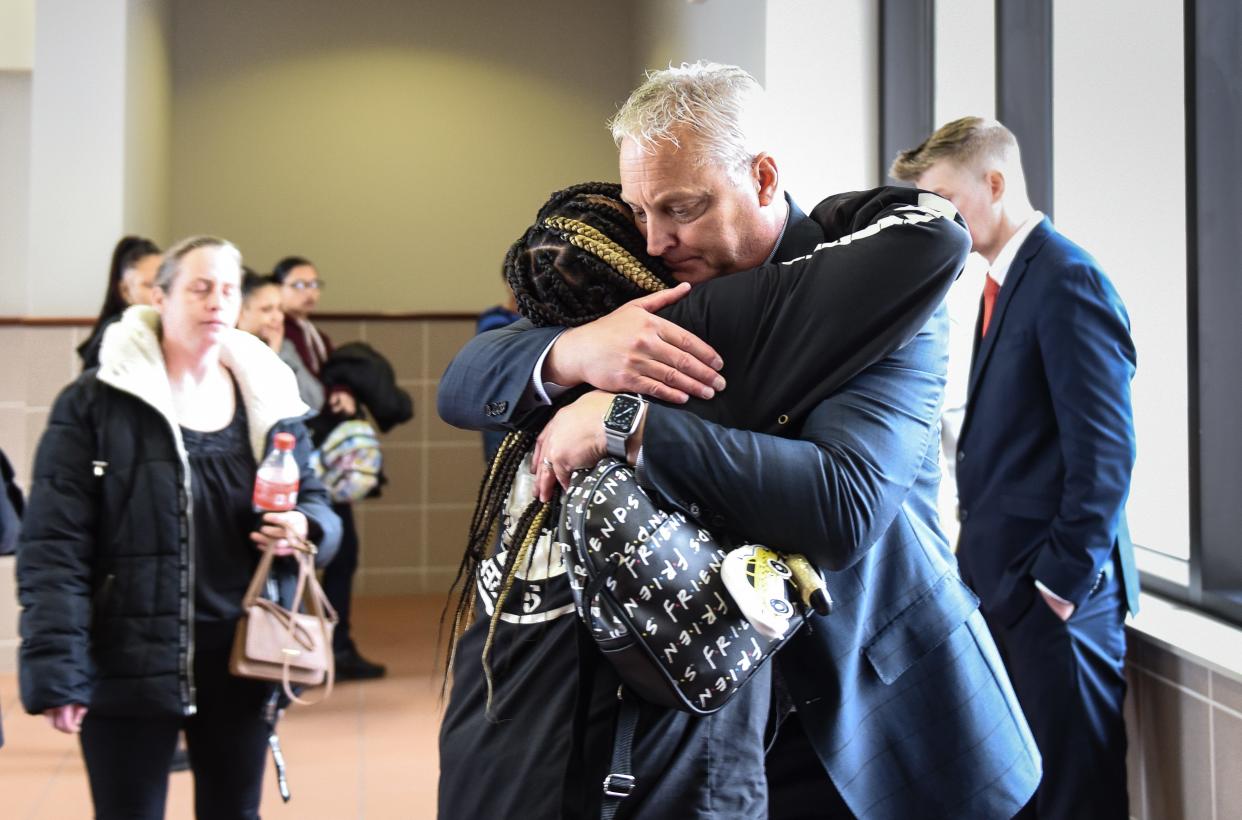 Mariah Westen hugs Deputy Chief Assistant Prosecutor John Dewane Monday, April 18, 2022, at Veteran's Memorial Courthouse, after the jury found Abbieana Williams guilty of killing her two sons Jesse Kline IV, 4, and Aston Griffin, 8, and her mother Melissa Westen in a house fire in September 2020.