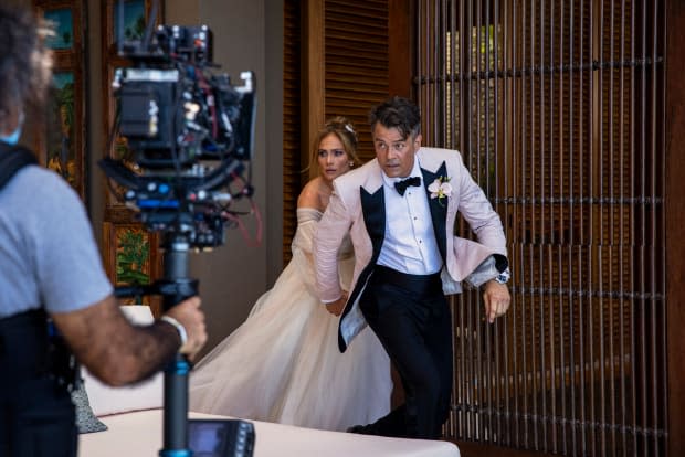 Darcy (Jennifer Lopez), her wedding dress and Tom (Josh Duhamel) begin their island adventure.<p>Photo: Ana Carballosa/Courtesy of Lionsgate</p>