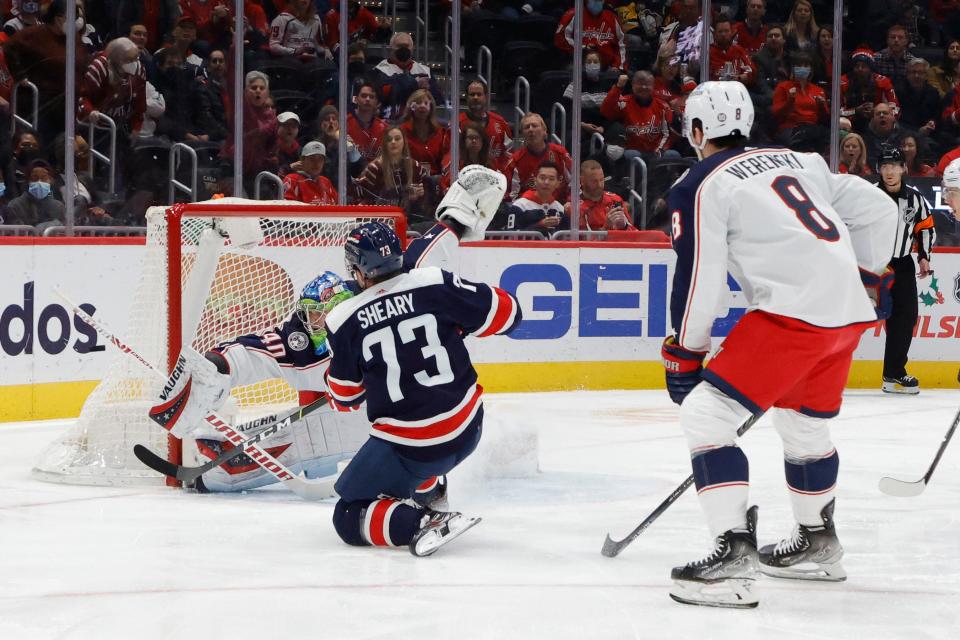 Dec 4, 2021; Washington, District of Columbia, USA; Washington Capitals left wing Conor Sheary (73) shoots the puck on Columbus Blue Jackets goaltender Daniil Tarasov (40) during the first period at Capital One Arena. Mandatory Credit: Geoff Burke-USA TODAY Sports