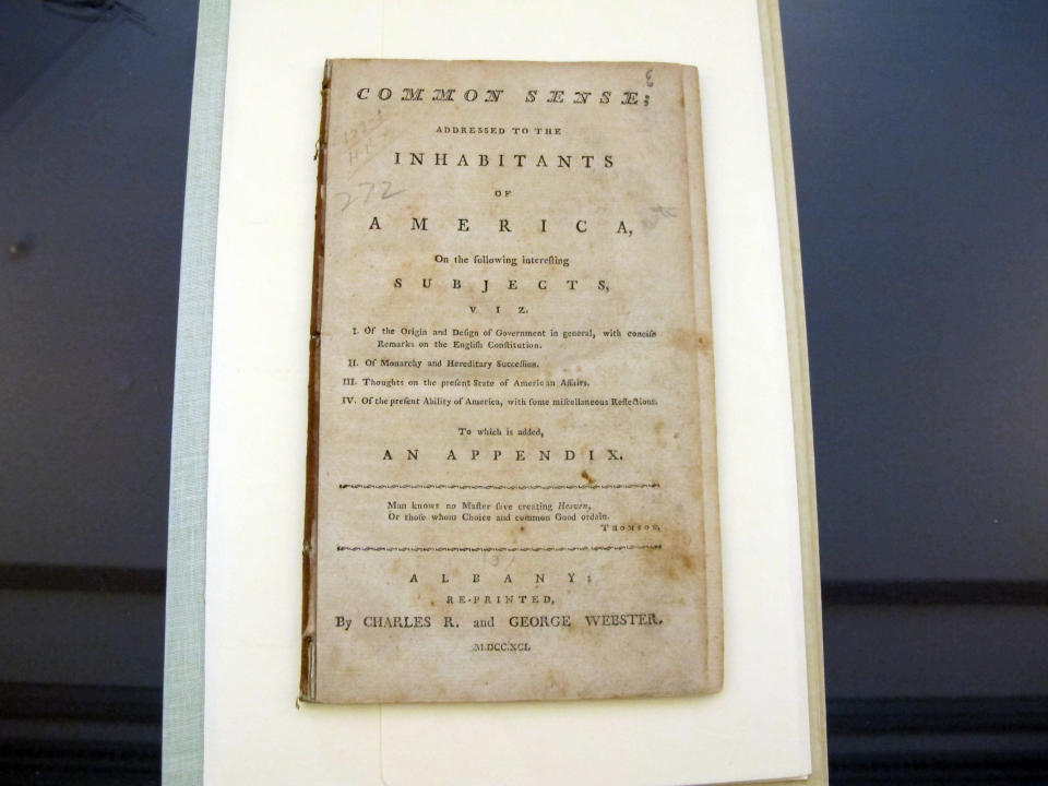 In this Tuesday, Aug. 20, 2013 photo, an early edition of Thomas Paine's "Common Sense" is displayed at Iona College in New Rochelle, N.Y. A once-endangered collection of about 300 Paine-related pieces is the cornerstone of a new Institute for Thomas Paine Studies at Iona. (AP Photo/Jim Fitzgerald)