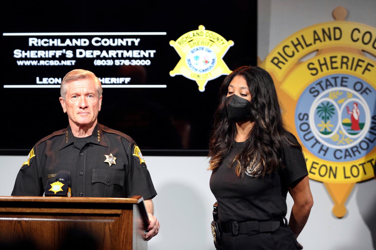 Richland County Sheriff Leon Lott, left, and Coroner Nadia Rutherford, right, talk about the heat deaths of two 20-month-old twin boys during a news conference on Tuesday 21 September 2021, in Columbia, South Carolina.  (AP)