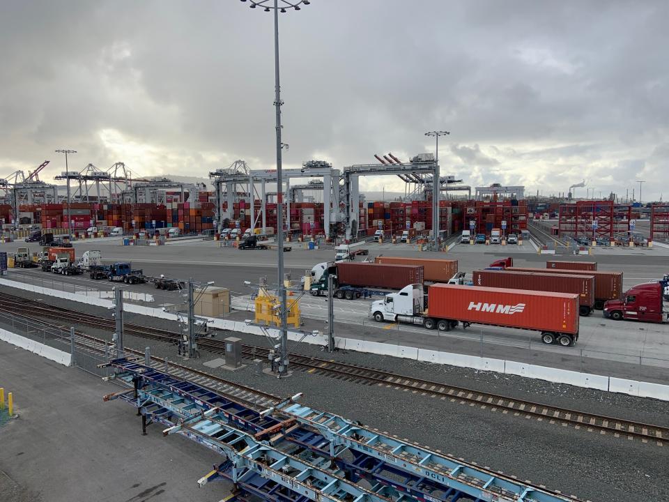 trucks line up to enter a terminal at the Port of Long Beach