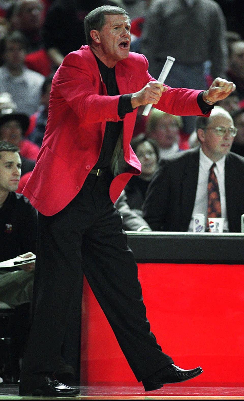 UofL coach Denny Crum reacts during the Cards game against Georgia Tech. The win gave Crum his 600th victory.1/11/97