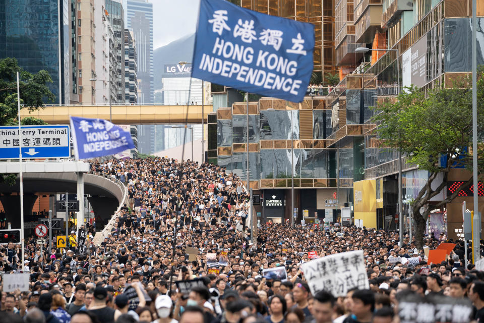 HONG KONG, CHINA - 2019/07/07: Protesters carry aa Hong Kong independence flag during the anti government march. Hundreds of thousands of anti government protesters marched and rallied to the West Kowloon High Speed Railway Station to demand the Hong Kong government to withdraw the extradition bill and to set up an independent commission to investigate on the police brutality while they used force to handle the protesters during the anti extradition bill protests in June. (Photo by Geovien So/SOPA Images/LightRocket via Getty Images)