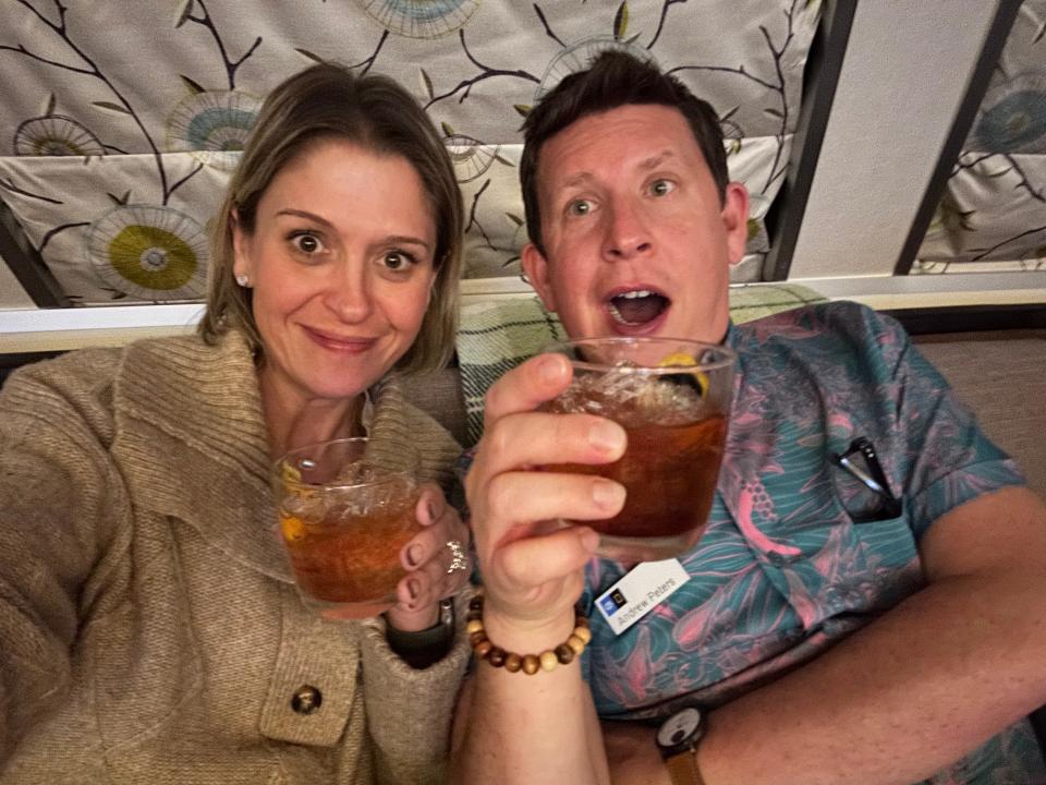 Terri Peters and her husband drinking mocktails and a cocktail on their vacation.