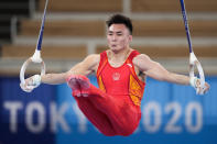 China's Sun Wei competes on the rings during men's artistic gymnastic qualifications at the 2020 Summer Olympics, Saturday, July 24, 2021, in Tokyo. (AP Photo/Ashley Landis)