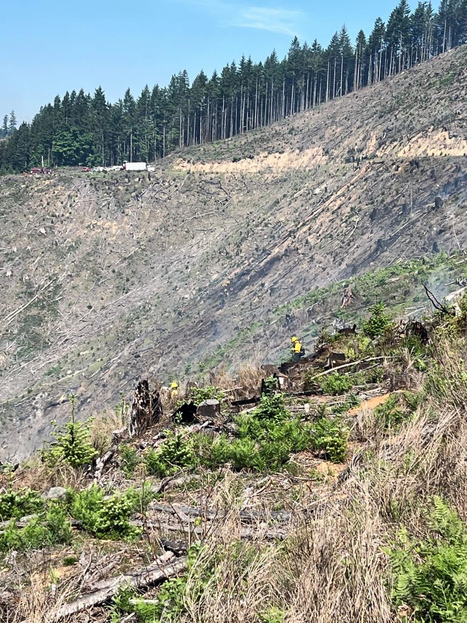 A firefighter works along a ridge on the 7K Fire.