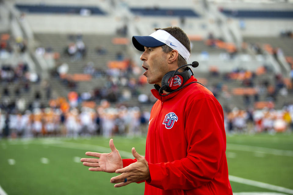 Liberty coach Jamey Chadwell argues a rule by the officials during the second half of an NCAA college football game against UTEP on Saturday, Nov. 25, 2023, in El Paso, Texas. Liberty won 42-28. (AP Photo/Andres Leighton)