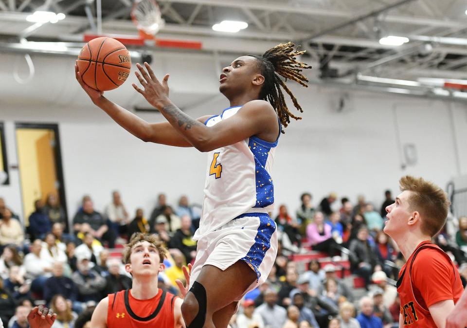 Lincoln Park’s Mikey Crawford shoots the ball during Friday’s PIAA Class 4A quarterfinal game against North Catholic at Fox Chapel High School.