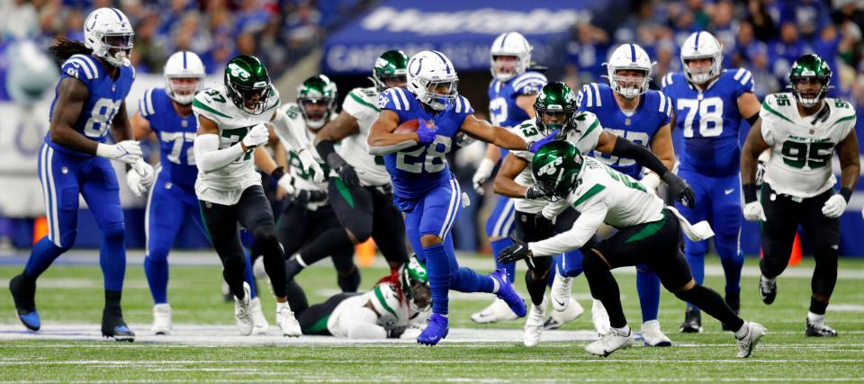 Indianapolis Colts running back Jonathan Taylor (28) rushes the ball Thursday, Nov. 4, 2021, during a game against the New York Jets at Lucas Oil Stadium in Indianapolis.