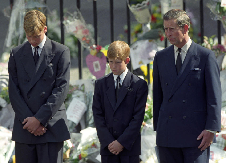 Prince of Wales, Prince Harry and Prince William walking behind the funeral cortege of Diana, Princess of Wales on Sept. 6 1997. (Adam Butler / PA Images via Getty Images)
