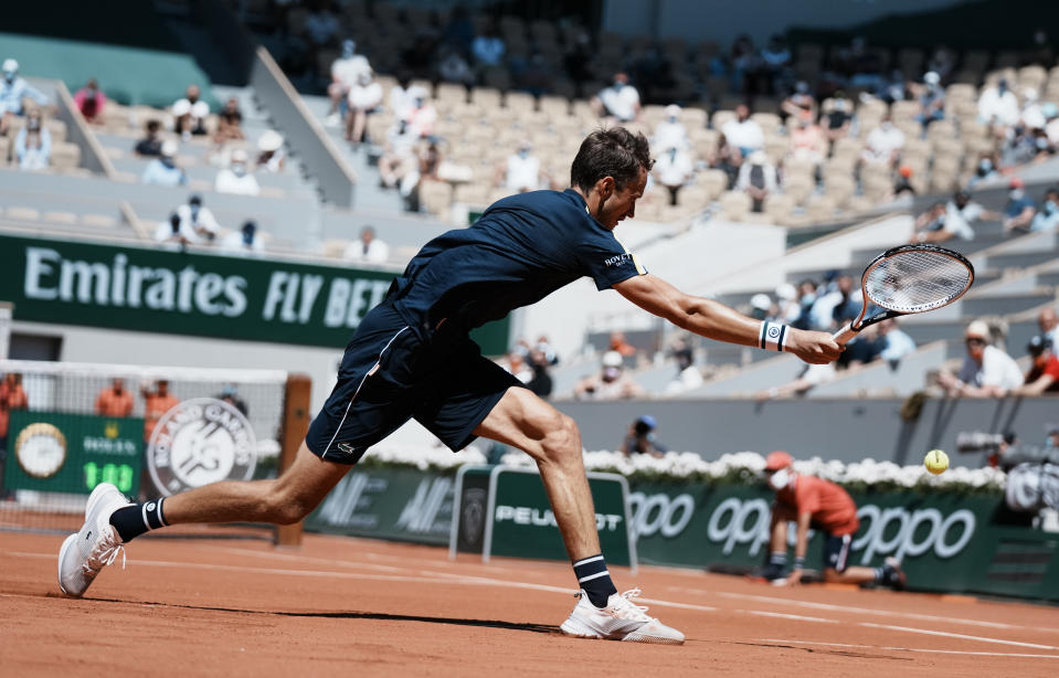 Russia's Daniil Medvedev plays a return to Kazakhstan's Alexander Bublik during their first round match on day two of the French Open tennis tournament at Roland Garros in Paris, France, Monday, May 31, 2021. (AP Photo/Thibault Camus)