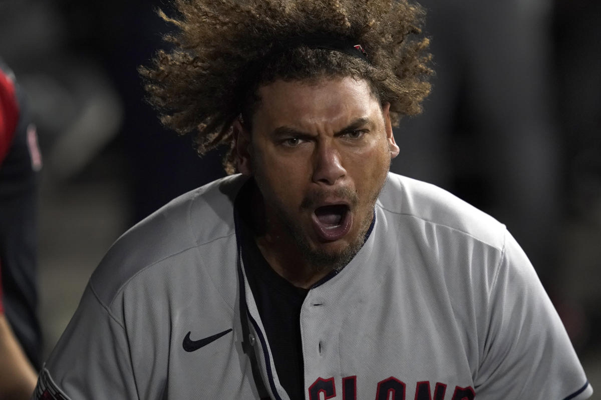 Cleveland Guardians' Josh Naylor, left, and Bo Naylor, right, celebrate in  the locker room after defeating the Tampa Bay Rays in the wild card  baseball playoff, Saturday, Oct. 8, 2022, in Cleveland. (