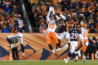 <p>David Njoku (85) of the Cleveland Browns goes up for a catch as Will Parks (34) of the Denver Broncos defends during the first half on Saturday, December 15, 2018. (Photo by AAron Ontiveroz/The Denver Post via Getty Images) </p>
