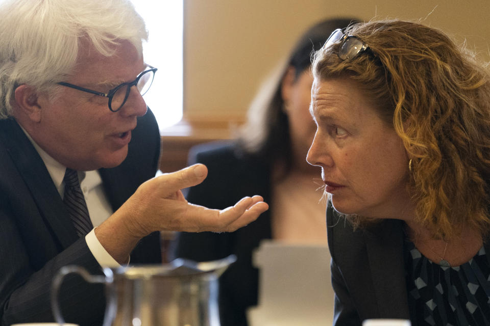 Metro Nashville Law Director Wally Dietz, left, confers with attorney Lora Fox during a status hearing in Chancellor I'Ashea L. Myles courtroom Monday, May 22, 2023 in Nashville, Tenn. The parents of children at The Covenant School following a school shooting in March, want the records to remain secret. (AP Photo/George Walker IV)