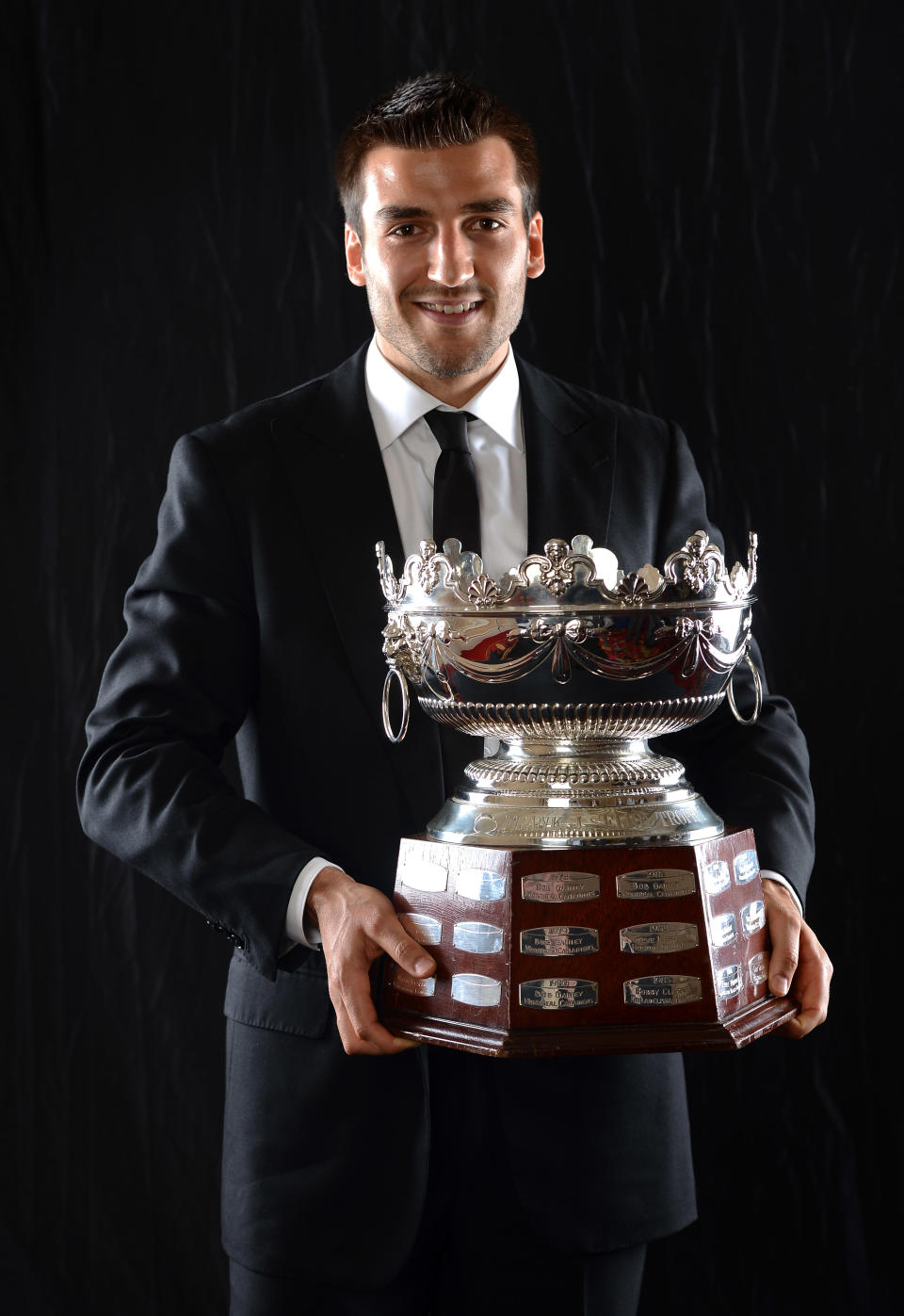 LAS VEGAS, NV - JUNE 20: Patrice Bergeron of the Boston Bruins poses after winning the Frank Selke Trophy during the 2012 NHL Awards at the Encore Theater at the Wynn Las Vegas on June 20, 2012 in Las Vegas, Nevada. (Photo by Harry How/Getty Images)