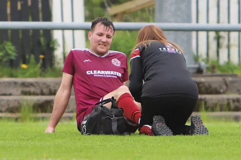 Paul McGeough receives treatment during Shotts' win over Rutherglen at the weekend -Credit:Gavin Campbell