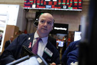 Trader Patrick Casey works on the floor of the New York Stock Exchange, Thursday, Dec. 6, 2018. U.S. stocks tumbled in early trading Thursday following a sell-off in overseas markets. (AP Photo/Richard Drew)