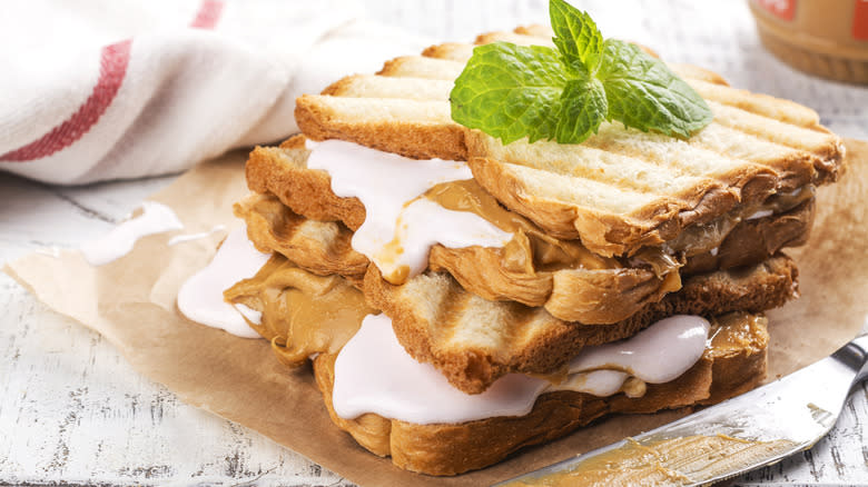 stacked fluffernutter sandwiches on grilled bread