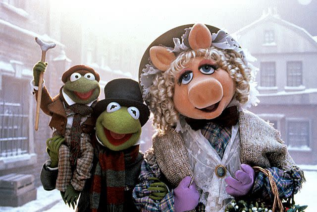 <p>Walt Disney Co./Courtesy Everett </p> Robin the Frog, Kermit and Miss Piggy in 'The Muppet Christmas Carol'