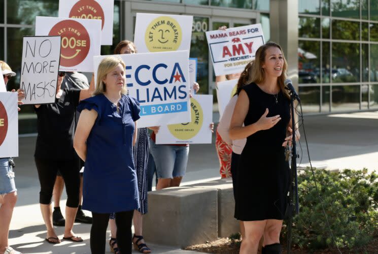 Caption: Sharon McKeeman (at microphone), founder of Let Them Breathe, is among the anti-mask-mandate parent activists in California running for school board in the November election. (<em>Courtesy of Sharon McKeeman</em>)