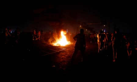 Demonstrators gather during an anti-government protest, in Baghdad