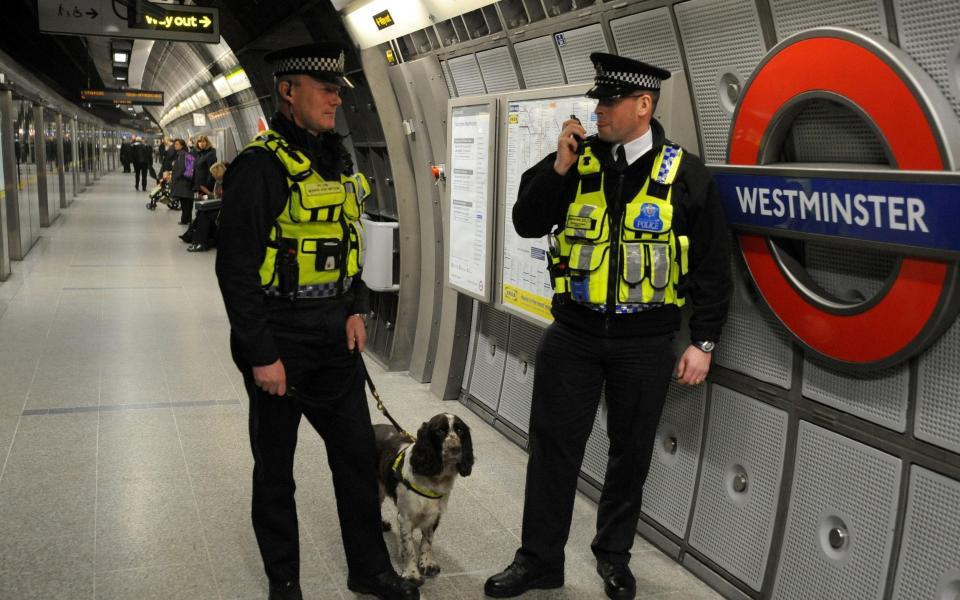British Transport Police officers using Airwave radios in 2009 - Ian Nicholson/PA Wire
