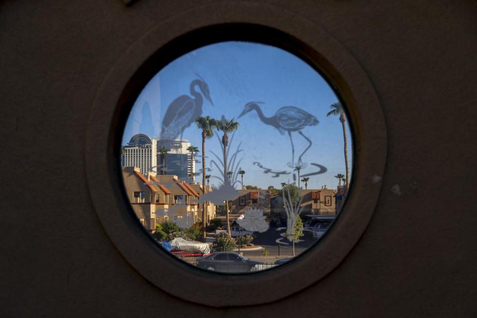 The Palms Casino Resort seen through a decorative window at Chinatown Plaza in Las Vegas.