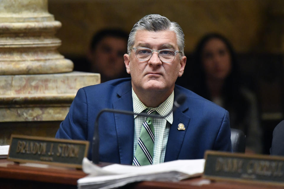 FILE - State Sen. Robby Mills listens to a reading during a session at the Kentucky State Capitol in Frankfort, Ky., March 16, 2023. Republican Daniel Cameron selected Mills as his running mate on Wednesday, July 18, in Kentucky's race for governor. (AP Photo/Timothy D. Easley, File)