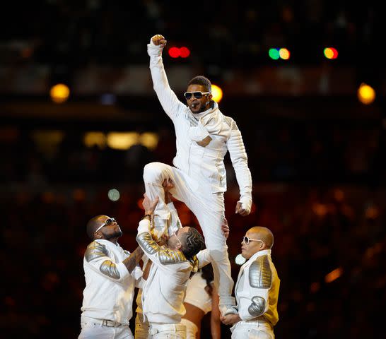 <p>Bob Rosato /Sports Illustrated via Getty </p> Usher during the Super Bowl XLV halftime show in Texas in 2011