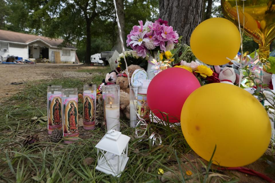 A makeshift memorial is shown Tuesday, May 2, 2023, outside the home where a mass shooting occurred last week in Cleveland, Texas. Five people were killed when the suspected gunman, Francisco Oropeza, allegedly shot his neighbors after they asked him to stop firing off rounds in his yard. (AP Photo/David J. Phillip)