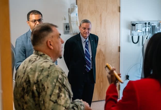 Dr. Lester Martinez-Lopez, Assistant Secretary of Defense for Health Affairs, center, listens during the tour of the newly opened Langley Veterans Affairs Clinic, at Joint Base Langley-Eustis, Virginia, May 20, 2024. (U.S. Air Force photo by Senior Airman Mikaela Smith)