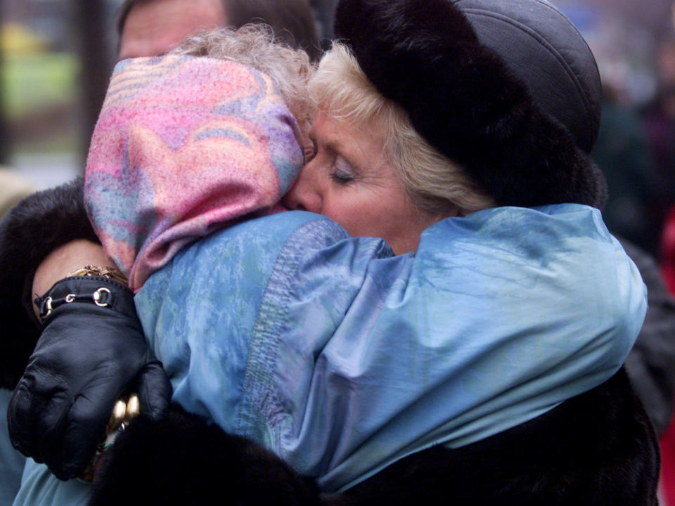 Suzanne LaPlante-Edward (R) and Michelle Lemay hug following a memorial service in Montreal, December 5. Both women had daughters killed in the 1989 Montreal Massacre. December 6, 1999, marks the tenth anniversary of Canada's worst mass shooting when Mark Lepine entered the University of Montreal engineering school armed with a semi-automatic assault rifle and knives and systematically shoot 14 young women in a hate-filled rampage. SB/BM