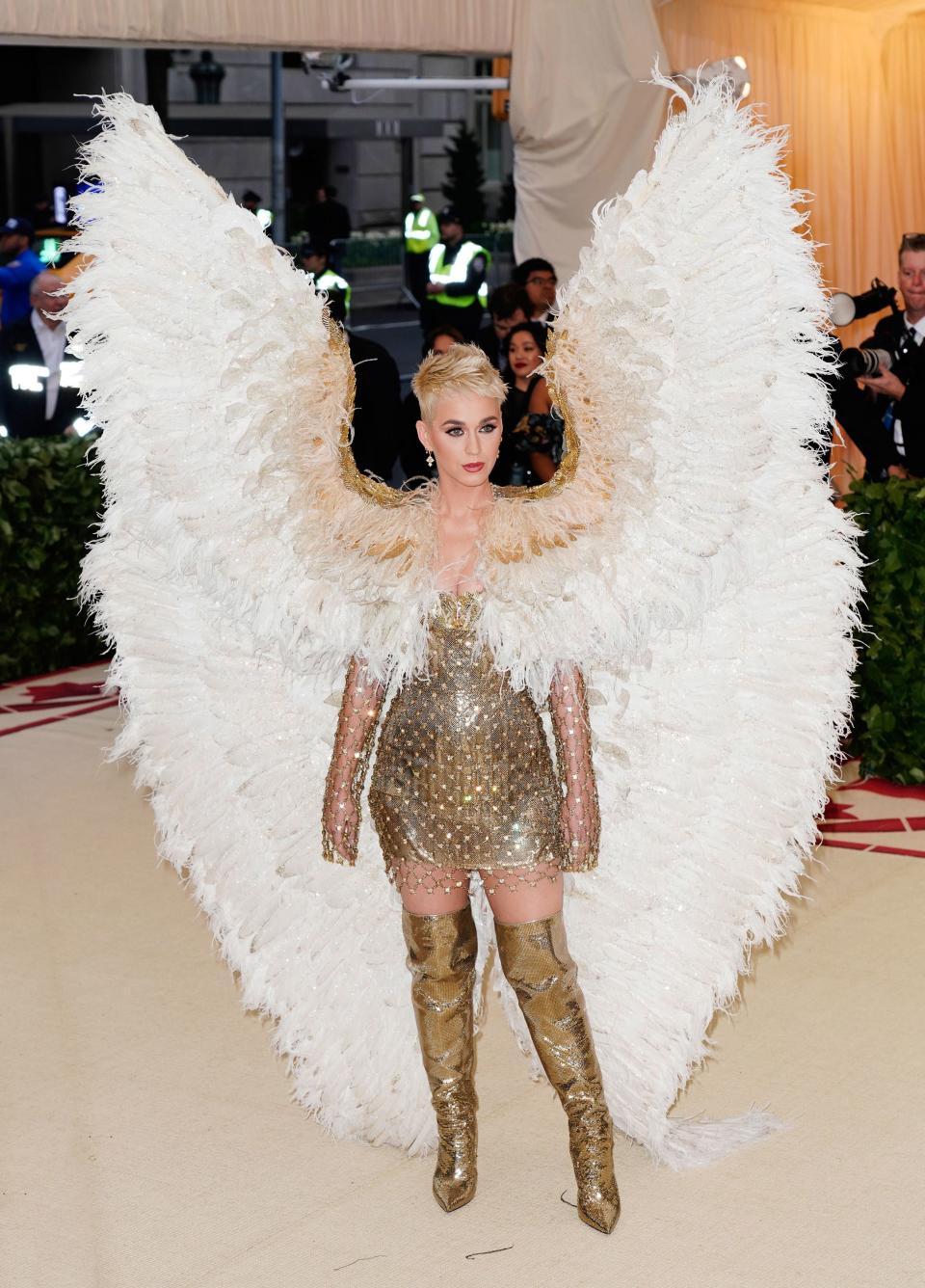 Rihanna’s 16-foot train, Cher’s naked dress, and Katy Perry’s angel wings included.