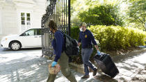 Federal agents carry a case inside a home of Russian oligarch Oleg Deripaska, Tuesday, Oct. 19, 2021 in Washington. An agency spokesperson says FBI agents were at a home in Washington connected to Deripaska to carry out "court-authorized law enforcement activity." (AP Photo/Manuel Balce Ceneta)