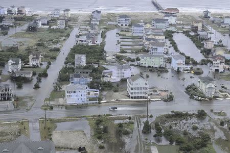 Flooding from Hurricane Arthur is pictured on the Outer Banks of North Carolina in this July 4, 2014 aerial handout photo provided by the U.S. Coast Guard. REUTERS/U.S. Coast Guard/Handout via Reuters