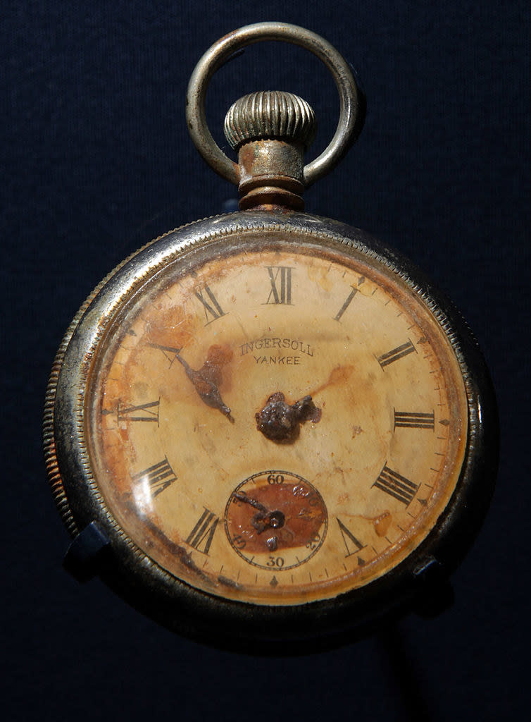 A very old pocket watch that's semi-rusted