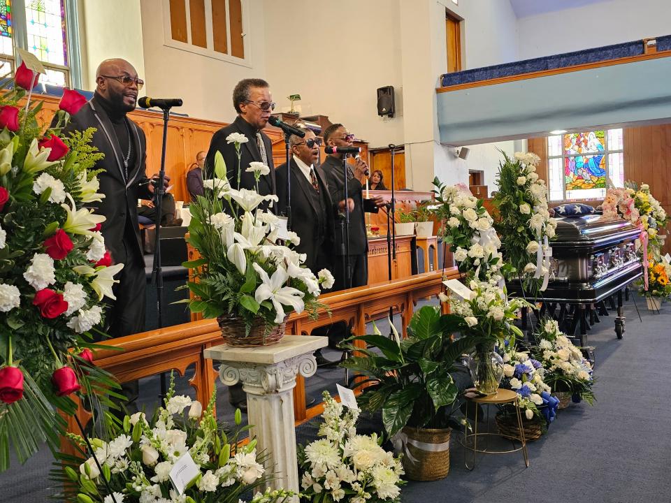 The current Spinners lineup performs at the funeral of the group's cofounder Henry Fambrough at St. Stephen A.M.E. Church in Detroit on Feb. 17, 2024. From left: C.J. Jefferson, Marvin Taylor, Ronnie Moss and Jessie Peck.