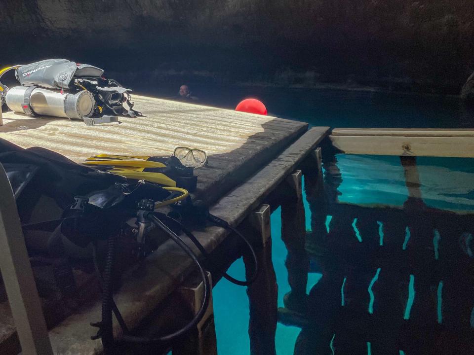 Scuba diving gear sits on the edge of the deck in the Homestead Crater.