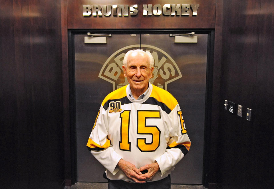 <p>BOSTON, MA – OCTOBER 14: Alumni legend Milt Schmidt of the Boston Bruins poses in front of the locker room prior to the game against the Detroit Red Wings at the TD Garden on October 14, 2013 in Boston, Massachusetts. (Photo by Steve Babineau/NHLI via Getty Images) </p>